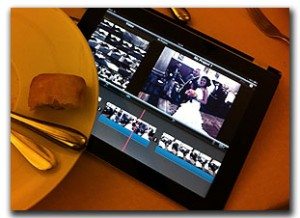 An ipad with a picture of a wedding on it.